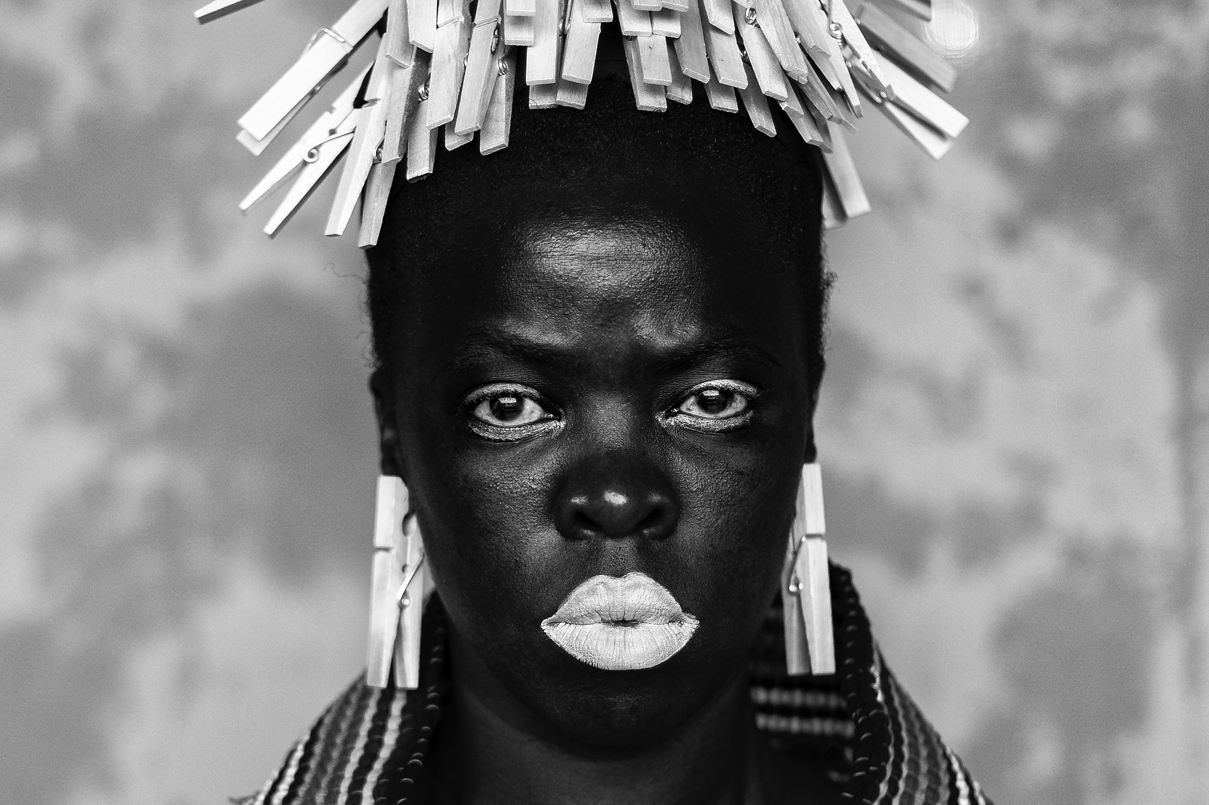 Photo - SOMNYAMA
NGONYAMA
 (close up image of a face by artist Zanele Muholi)