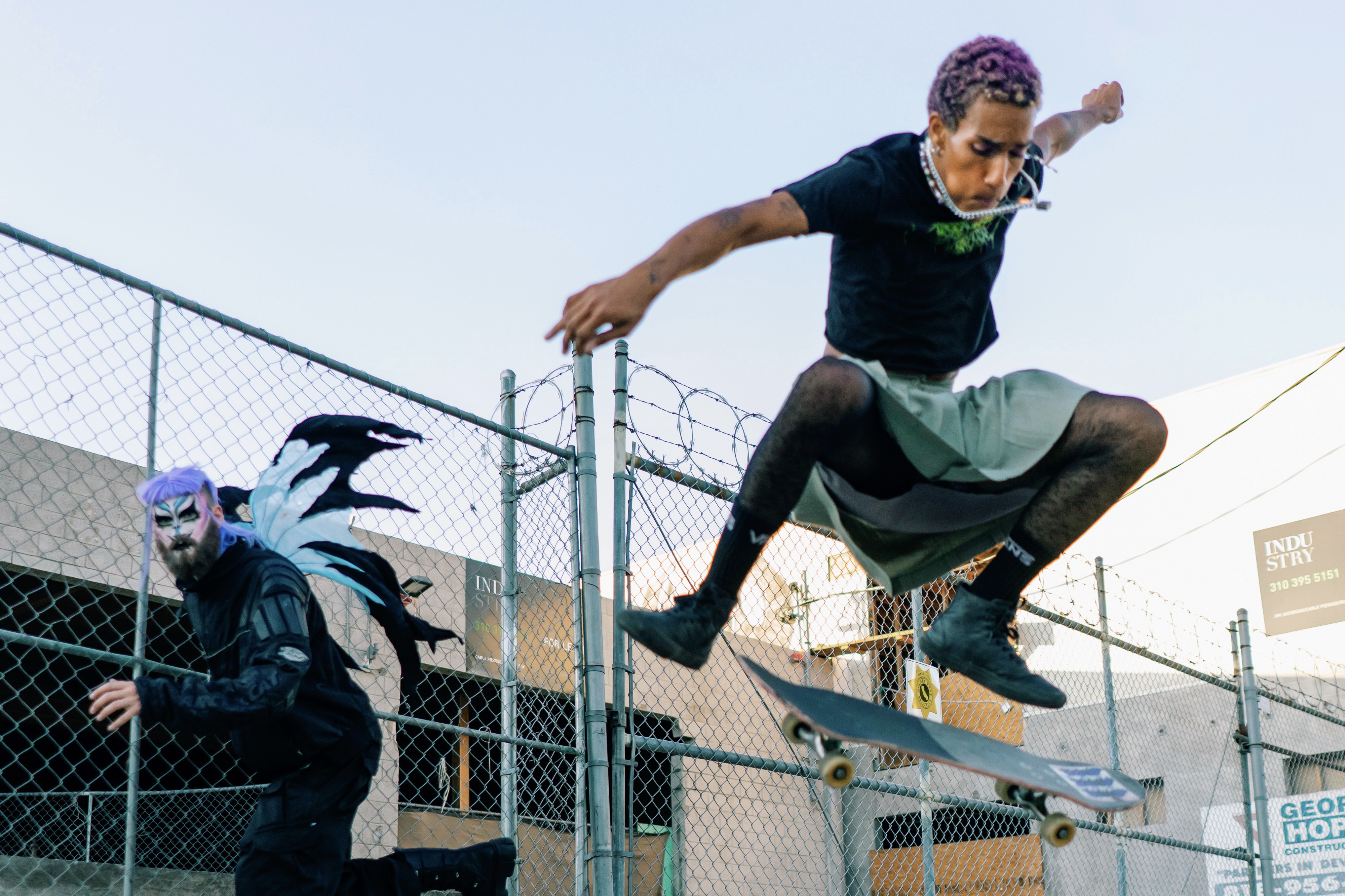 Photo - FIX YOUR PONY!  (colour photograph of person skateboarding)